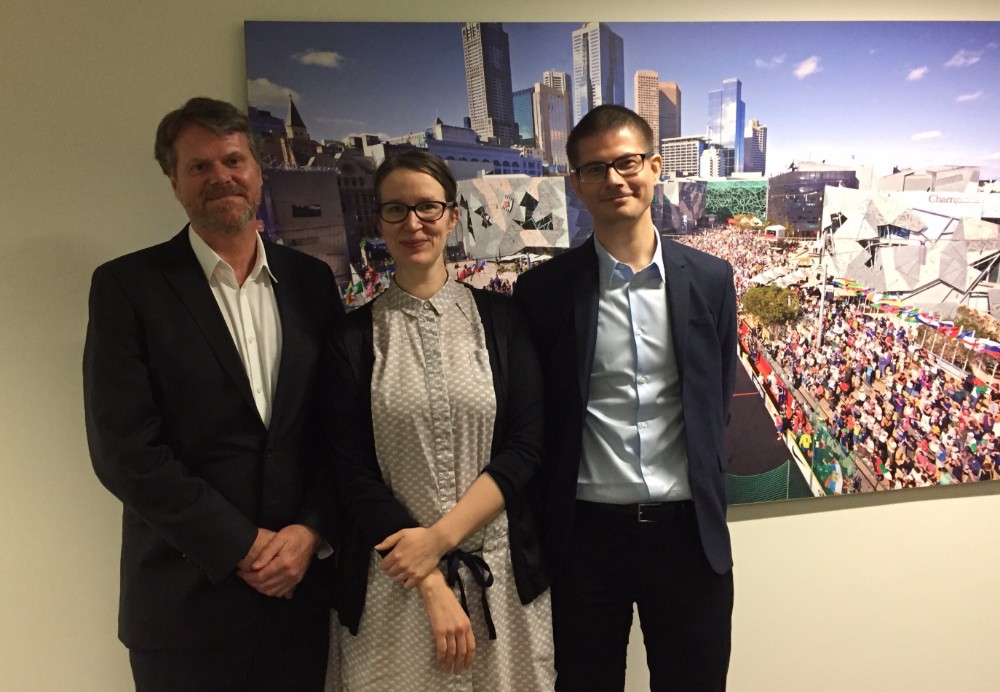 Hannele Huhtala and Janne Hukka from Iso Numero with The Big Issue Australia CEO Steven Persson. 