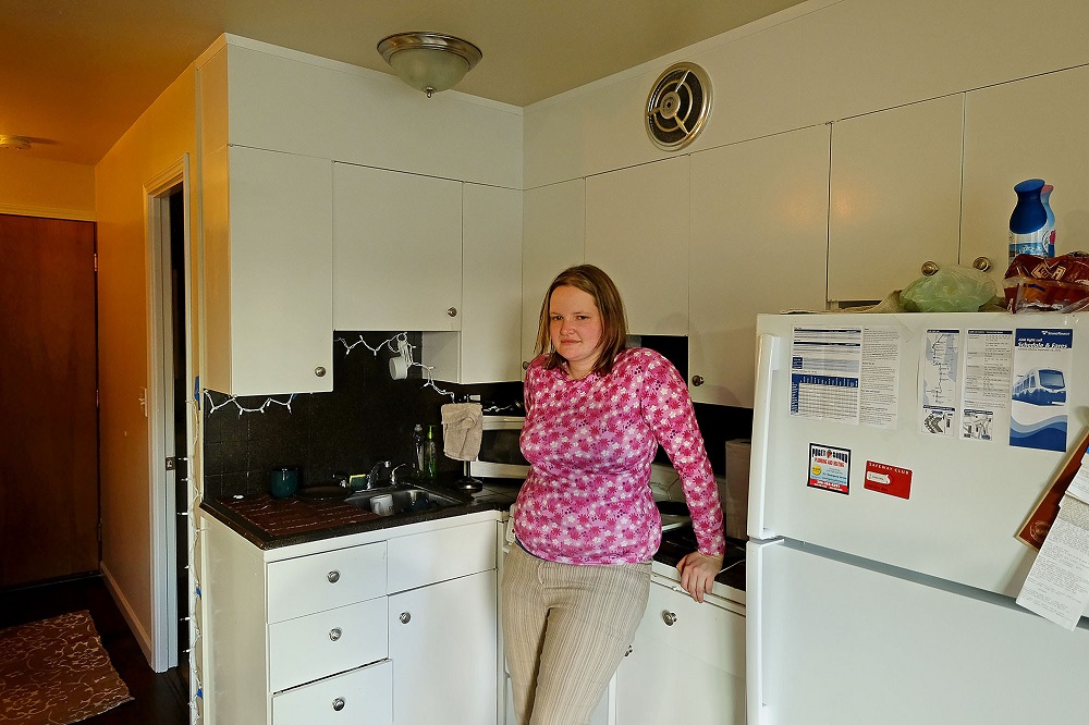 Lisa Sawyer in her apartment in Seattle's Greenwood neighborhood, Thursday March 16, 2017. Photo: Real Change