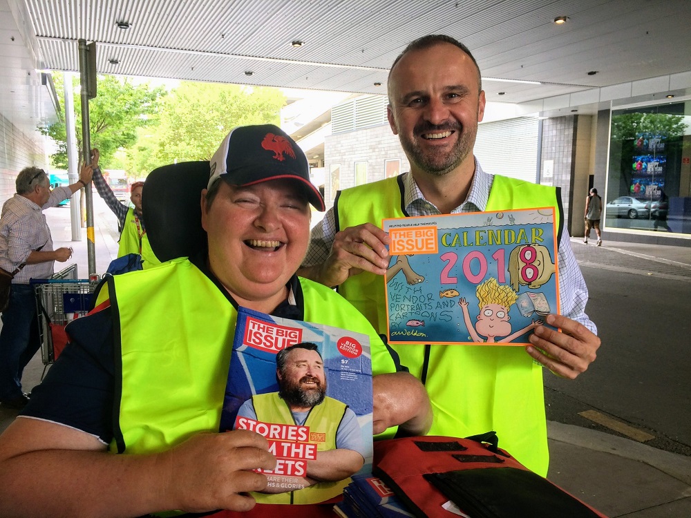 ACT Chief Minister Andrew Barr with Big Issue vendor Kylie in Canberra