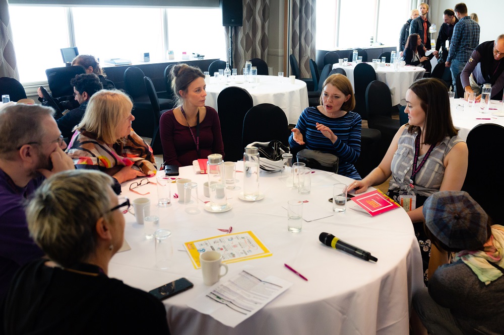 Suzanne Fitzpatrick talks with INSP staff and street paper delegates after her keynote speech. Credit: Jack Donaghy