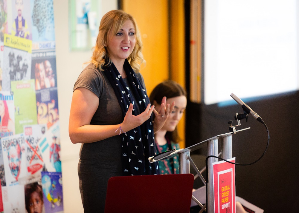 Sarah Murdoch from NHS Scotland talks to delegates about data collected from their street papers. Credit: Jack Donaghy