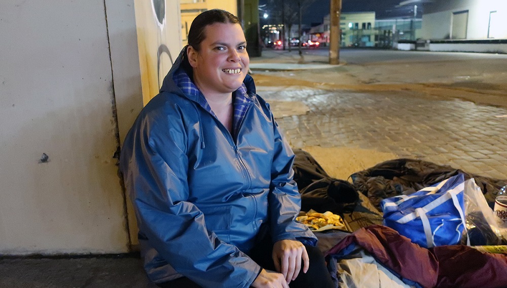 Street Roots vendor Amy Turco at her camp under the Morrison Bridge. (Credit: Helen Hill)