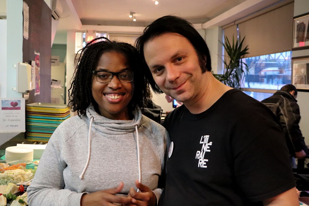 Emanuella, trainee in psychosocial intervention, with L'Itinéraire vendor Jean-Claude. Credit: Alexandre Duguay.