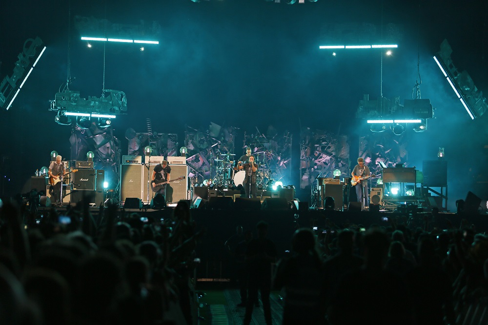 Gossard (far right) performs with Pearl Jam. (Photo credit: Matthew S. Browning)