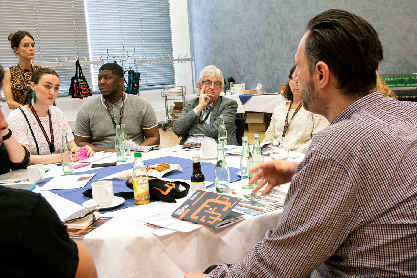 Just like old times: Mel Young participates in delegate discussions earlier in the day. (Credit: Andreas Fuchs)