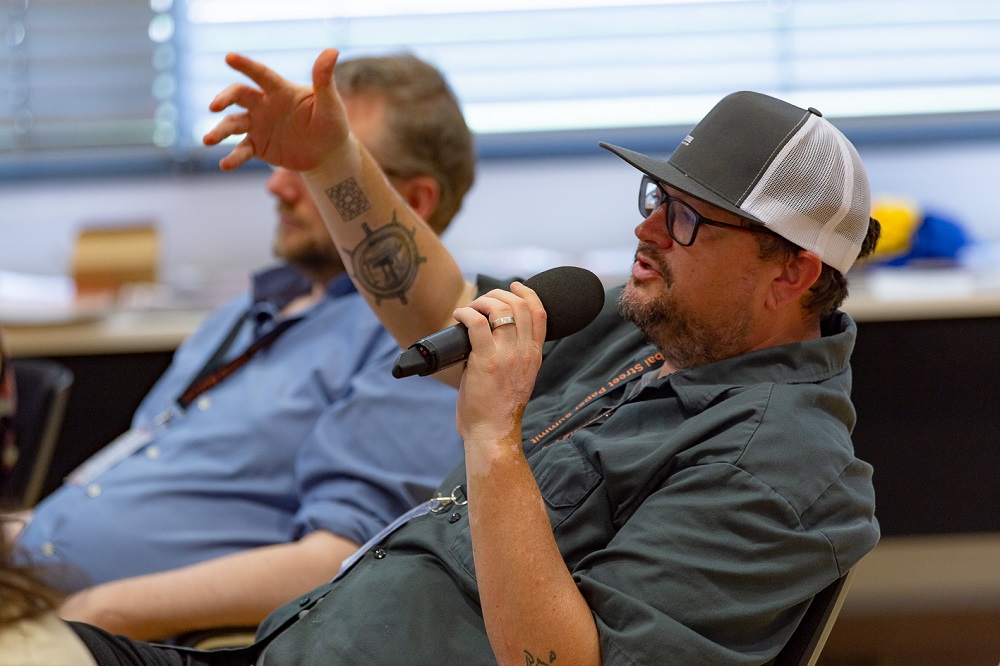 Delegate ask questions of Serrato after his keynote presentation. (Credit: Andreas Fuchs)