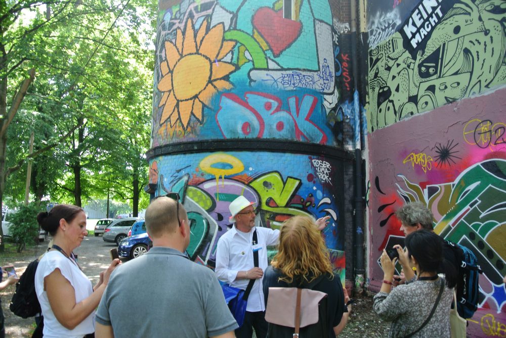 Thomas and delegates outside the ex-WWII bunker which was turned into a homeless shelter of sorts. Thomas talked of nights when the homeless people would be "locked in".