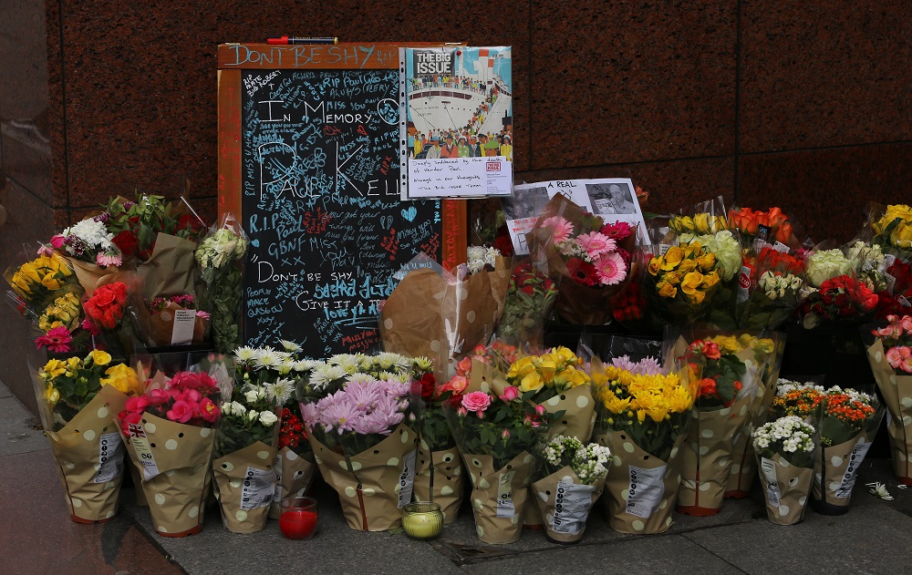 Tributes to Big Issue vendor Paul Kelly near the spot where he sold copies of the Big Issue on Buchanan Street, Glasgow. (Credit: Jamie Simpson/Herald & Times)