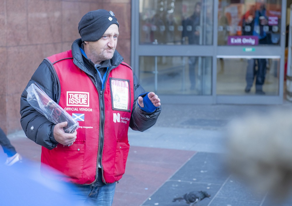 Big Issue vendor Paul Kelly at his pitch in Glasgow