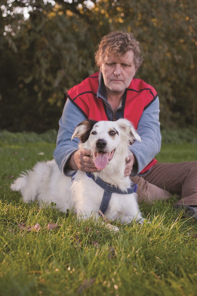 Big Issue vendor Steve Trigg and his canine companion Charlie. Credit: Olivia Hemingway