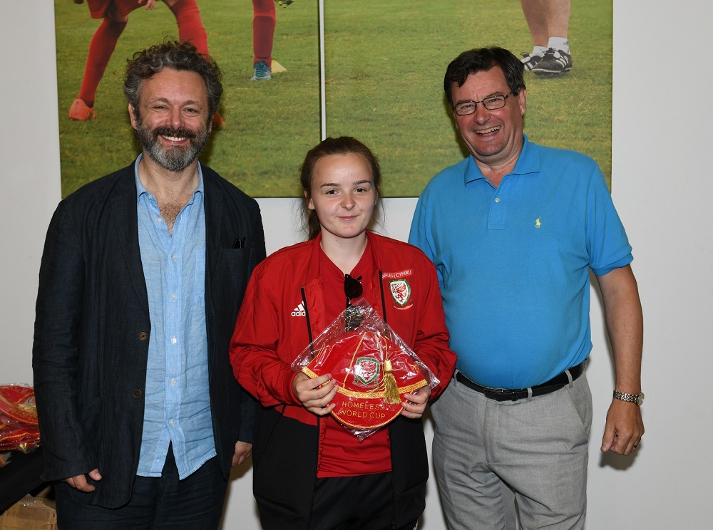 This year's captain of the Wales Homeless World Cup women's team, Reanna Walker, receiving her official cap