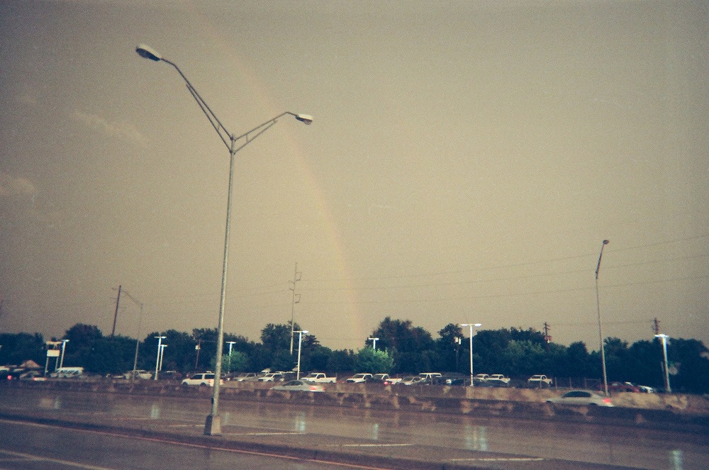 A rainbow emerges after an August storm.