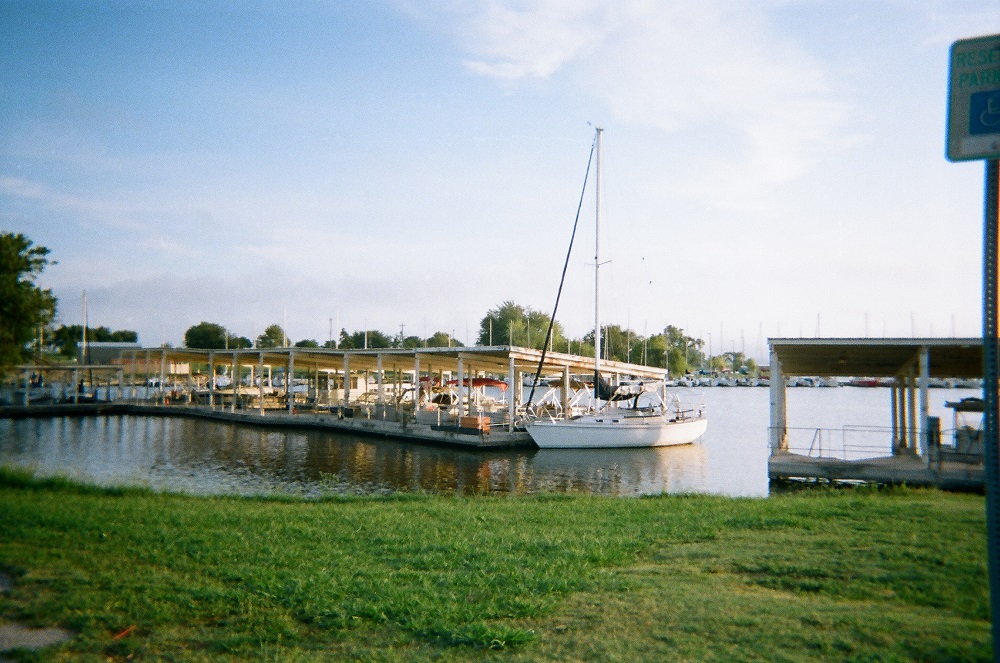 Boats sit on a dock at Lake Hefner the day after a storm. The scene reminded Teri of sailing in Florida. He lived there for several years and owned a boat.