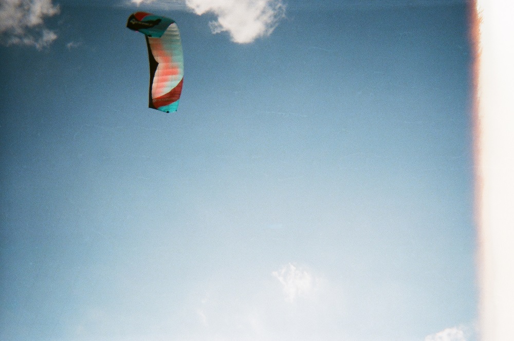 A kite surfer catches a breeze near Stars and Stripes Park. 