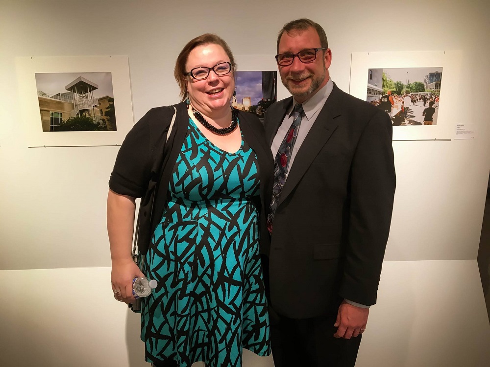 Amanda Faith Zuehlke, founder of Toledo Streets, with the street paper's current director John Keegan. [Photo courtesy of Toledo Streets]