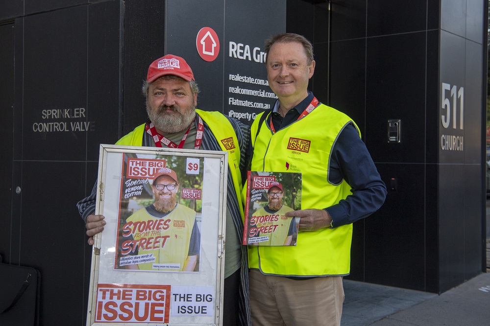 Big Issue Australia vendor Phil selling with REA CEO Owen Wilson. [Credit: Mark Avellino]