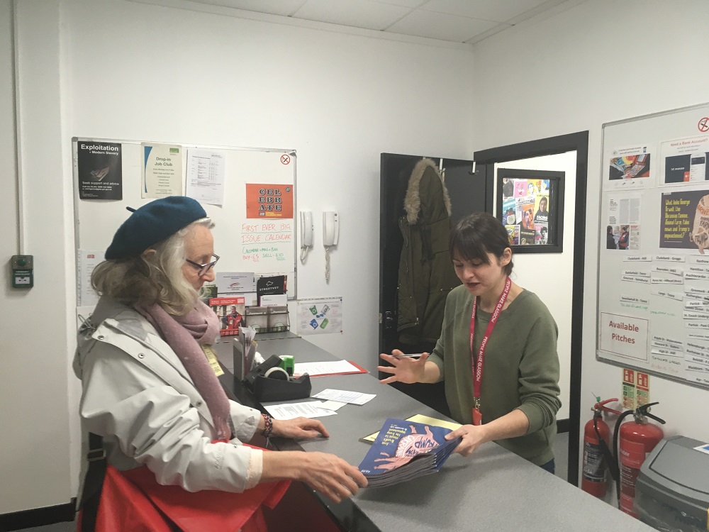 Anabel at The Big Issue distribution office collecting magazines.