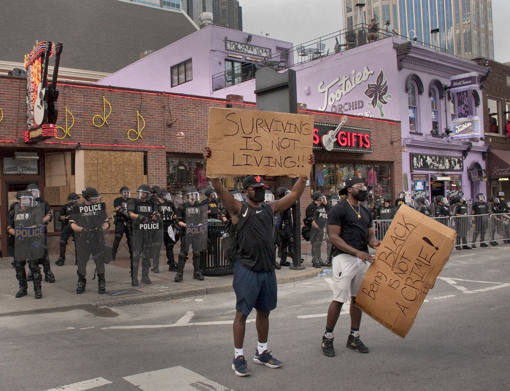 A group of six local teens, Teens for Equality, organized a massive march through downtown Nashville on Thursday, June 4. During the march, protesters walked behind a huge, Black Lives Matter banner and read the names of people who have been killed by police including George Floyd and Breonna Taylor. [By Alvine / The Contributor]