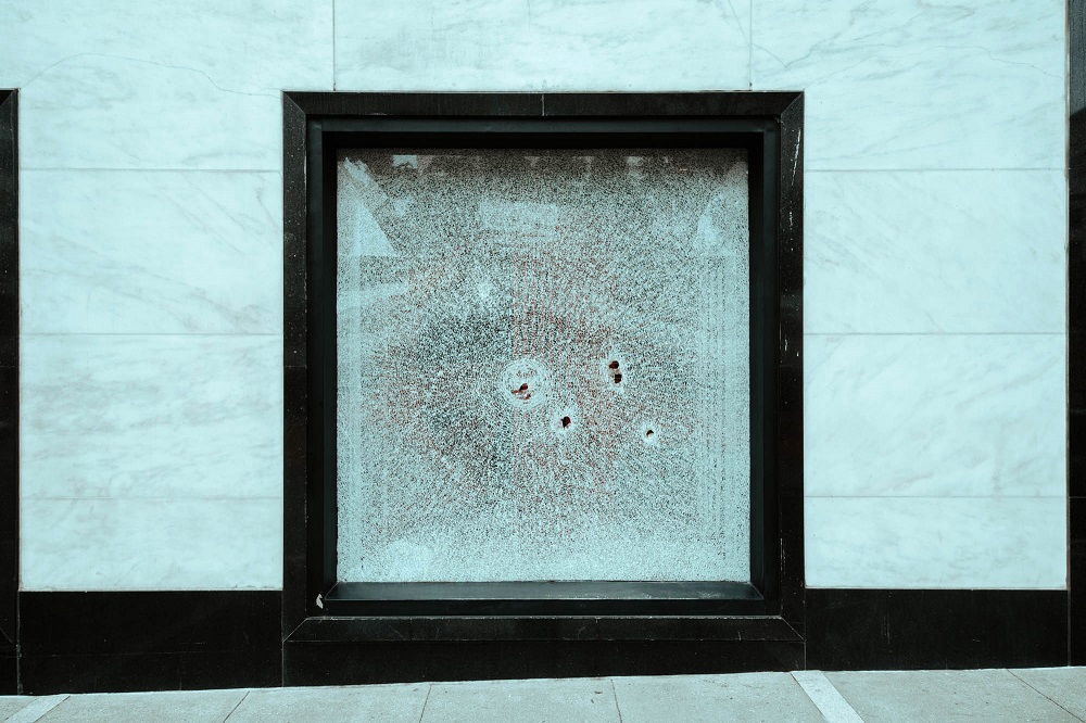 A broken window in Union Square. [Credit: Kit Castagne]