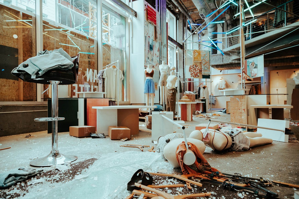 Broken glass and overturned mannequins inside a looted Urban Outfitters in Union Square. [Credit: Kit Castagne]