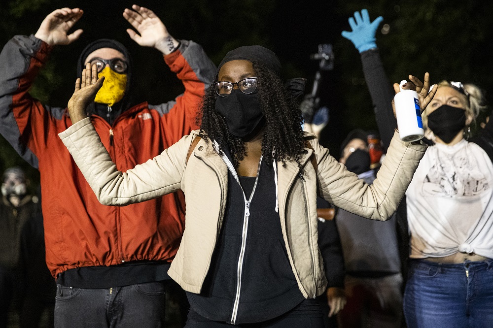 Sophie Mrazaga just moments before she was struck with a rubber bullet on June 5. Photo by Terray Sylvester