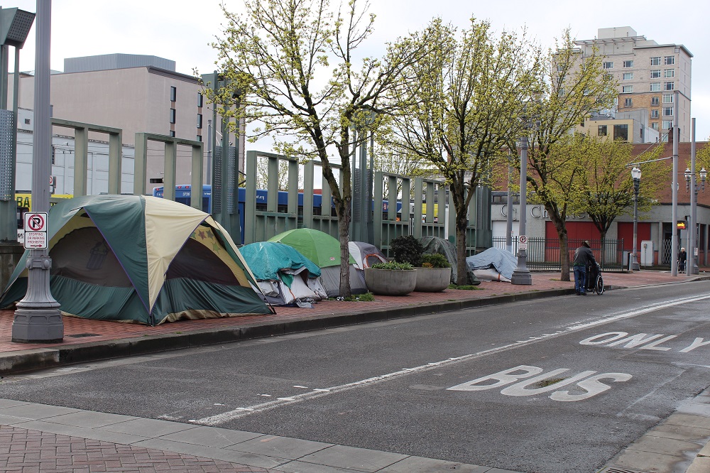 Tents line a sidewalk in Portland's Old Town. (Courtesy of Street Roots)