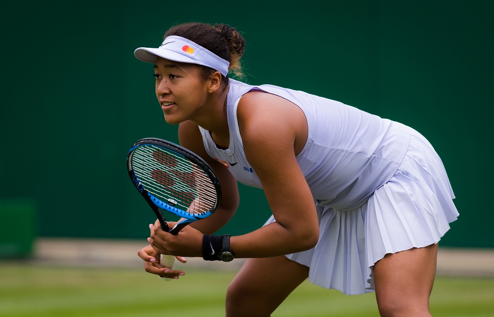 Naomi Osaka of Japan in action during her first-round match at the 2019 Nature Valley Classic WTA Premier tennis tournament. [Credit: Rob Prange / Creative Commons]