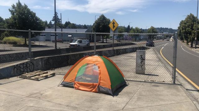 A tent pitched on the pavement of Portland, Oregon, USA this summer under high temperatures. Credit: Kaia Sand